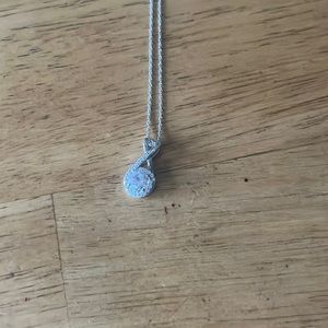 What sapphire rhodium over sterling silver pendant and chain